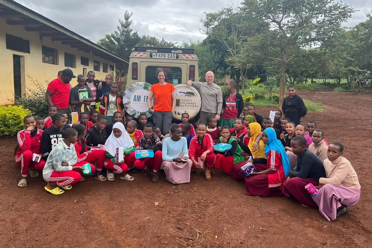Legacy guests meeting a Tanzanian school community